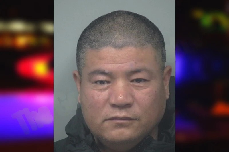 Yonggun Wang Mugshots