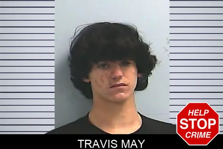 Travis May