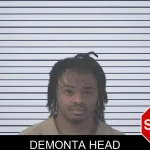 Demonta Head mugshot