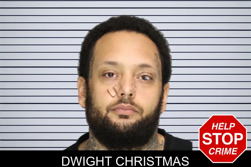 Dwight Christmas mugshot