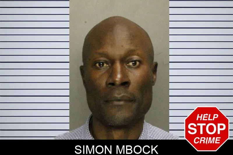 Simon Mbock mugshot