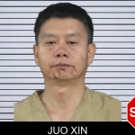 Juo Xin mugshot