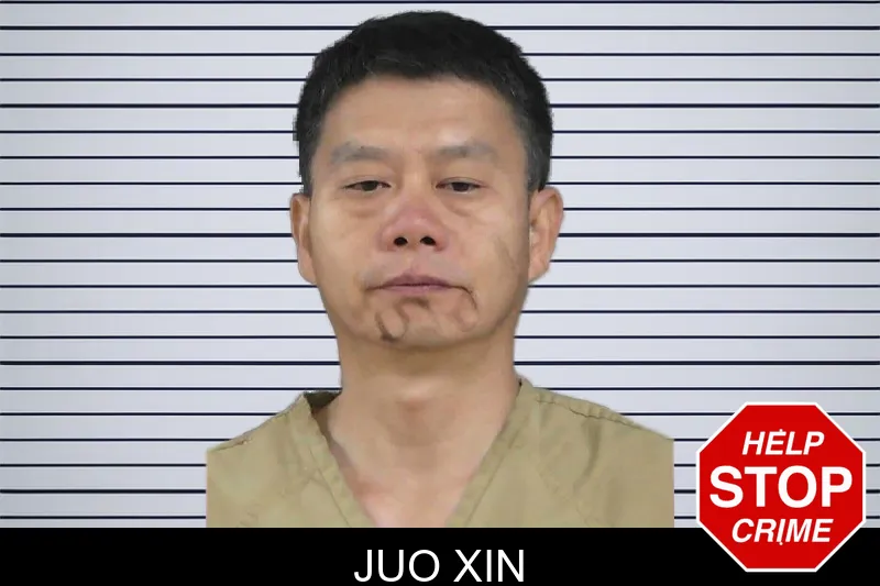 Juo Xin mugshot